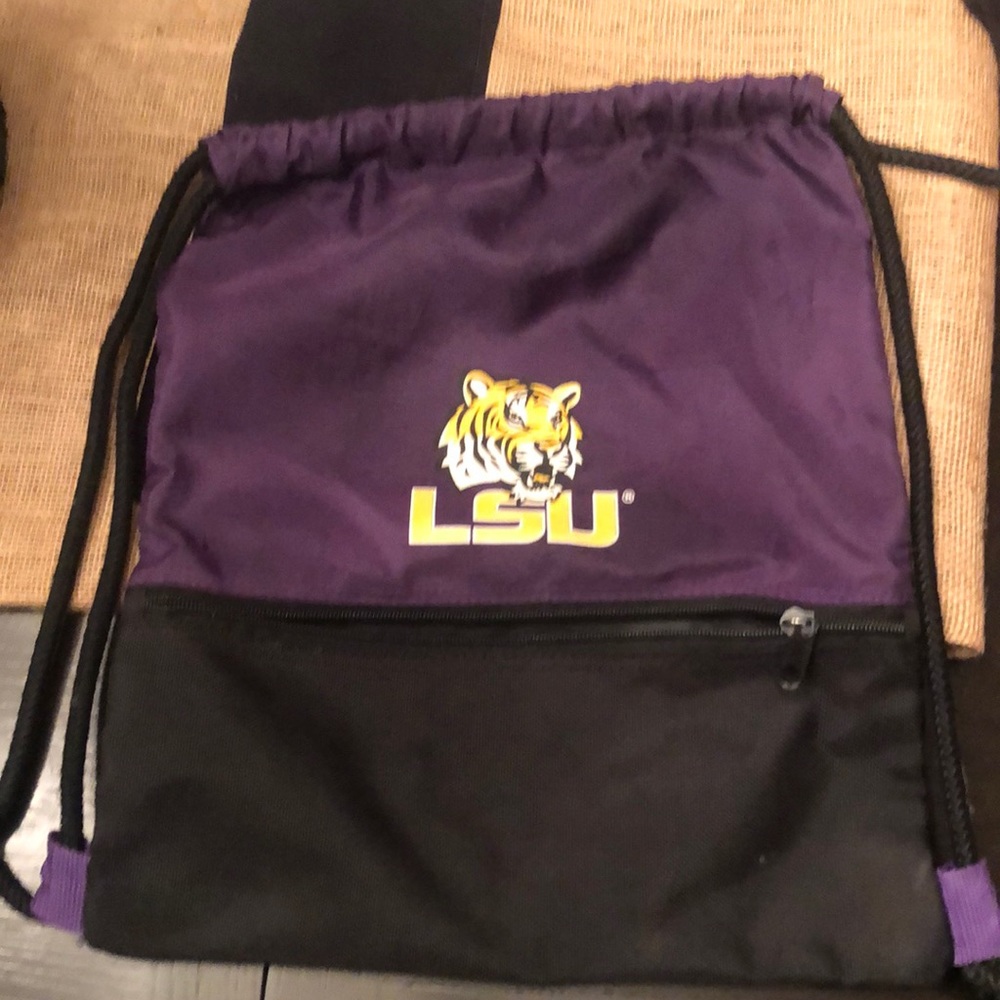 LSU purple/black with tiger and LSU emblem drawstring back pack